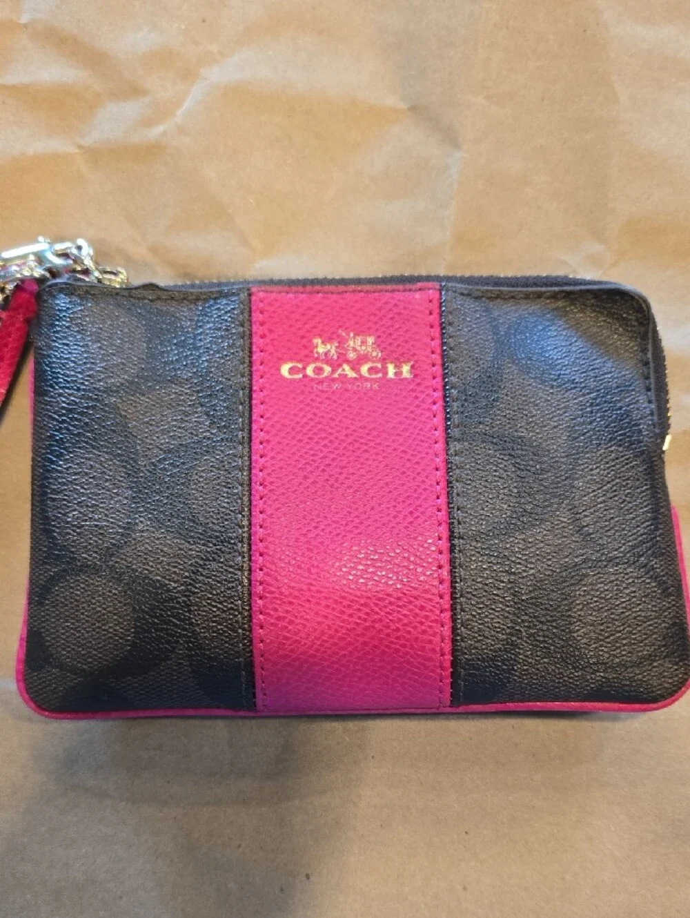 Coach Signature Canvas Wristlet Phone Case in Pink and Brown